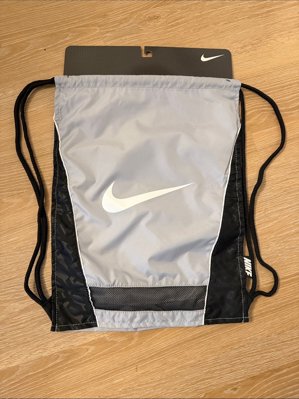 Two Nike Light Gray and Black Drawstring Sports Sack with White Swoosh